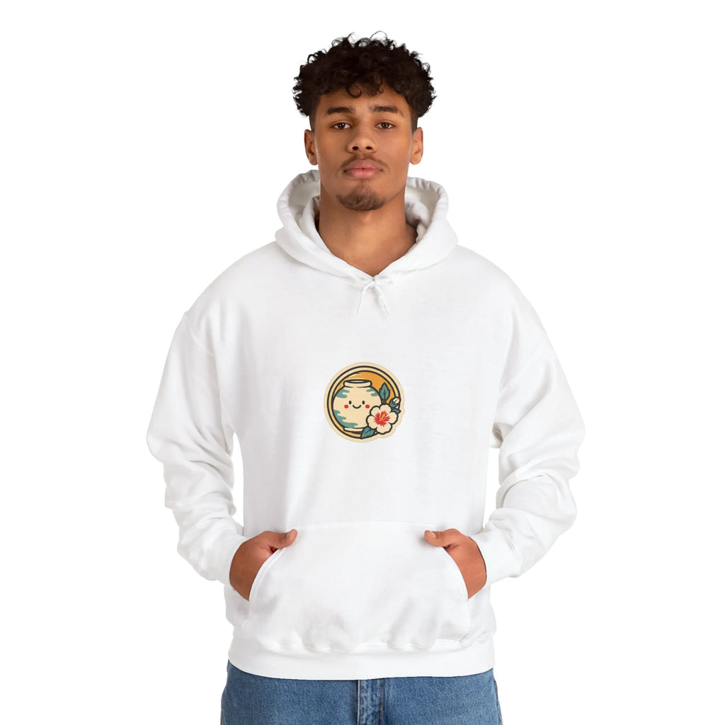 Man in an off-white hoodie with a round badge print on the chest