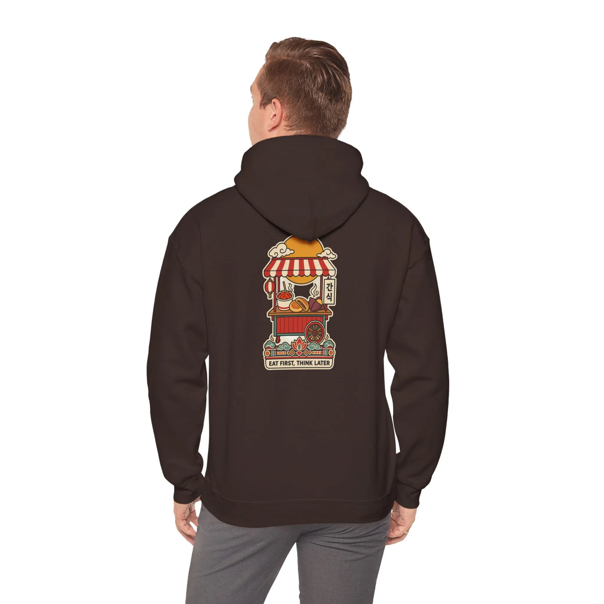 Back view of a coffee brown hoodie with a Korean street food cart print, worn by a man