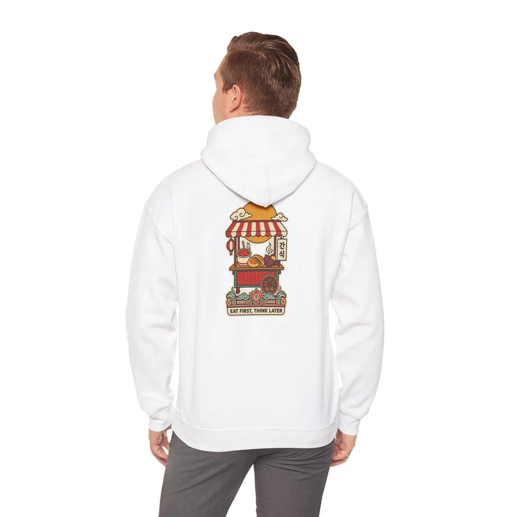 Back view of an off-white hoodie with a Korean street food cart print, worn by a man