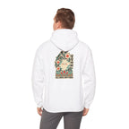 Back view of an off-white hoodie with a large graphic print, worn by a man