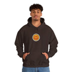 Man in a coffee brown hoodie with a small smiley face print on the chest