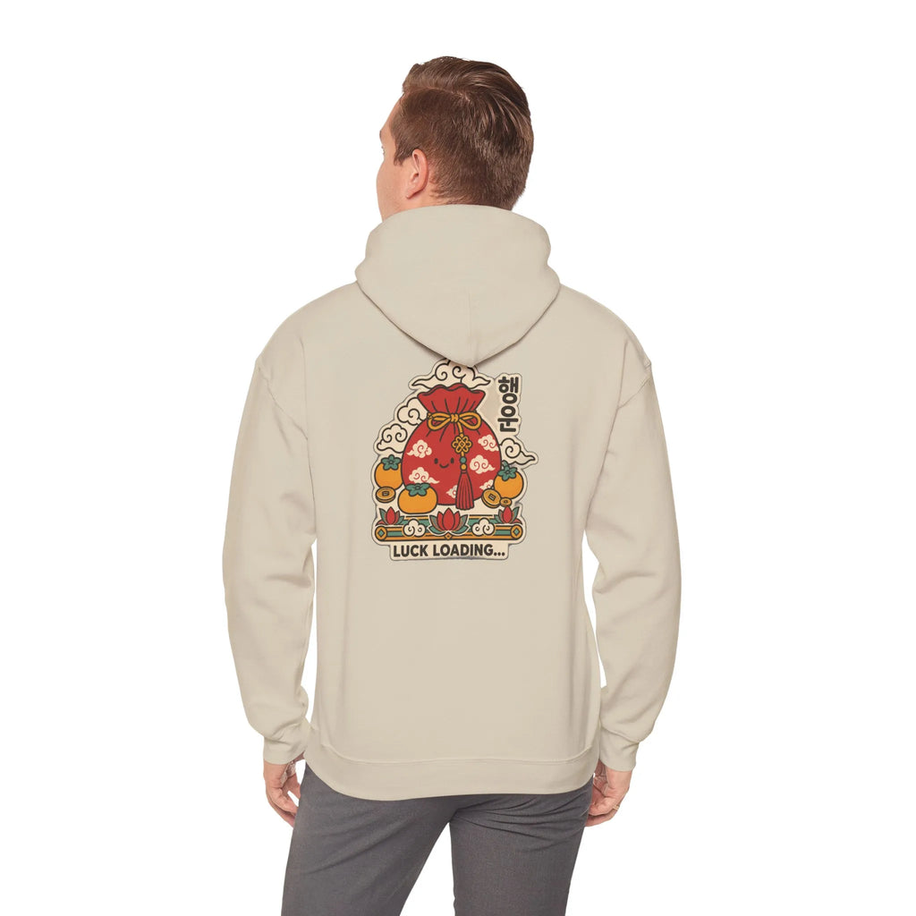 Back view of a beige hoodie with a lucky pouch, persimmons and coins print, worn by a man