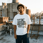 Model wearing "Main Character" Syndrome funky graphic tee, front view, rooftop