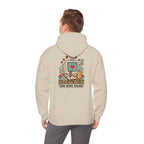 Back view of a beige hoodie with a late-night gaming graphic, worn by a man