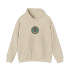Front of a beige hoodie with a small round gaming badge