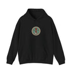 Front of a black hoodie with a small round gaming badge and kangaroo pocket