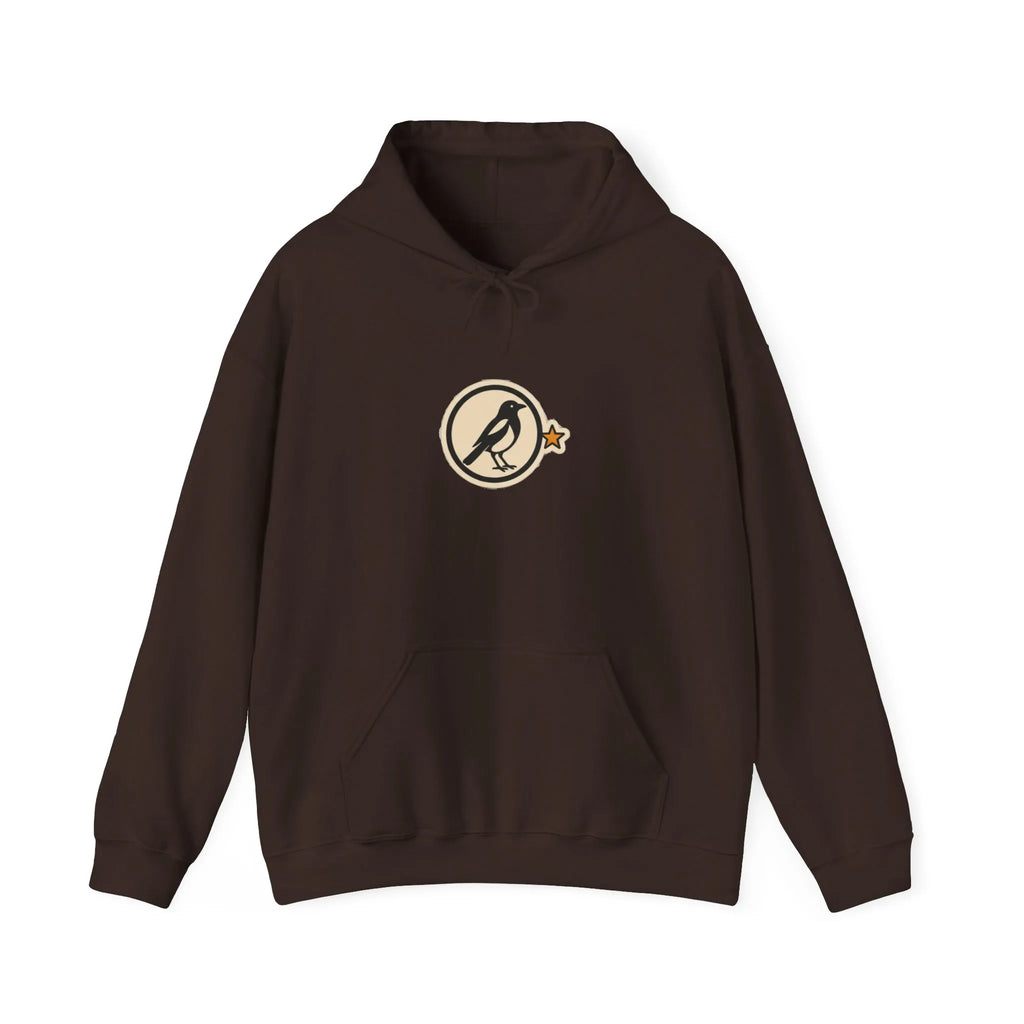 Front of a coffee brown hoodie with a small round athletic badge