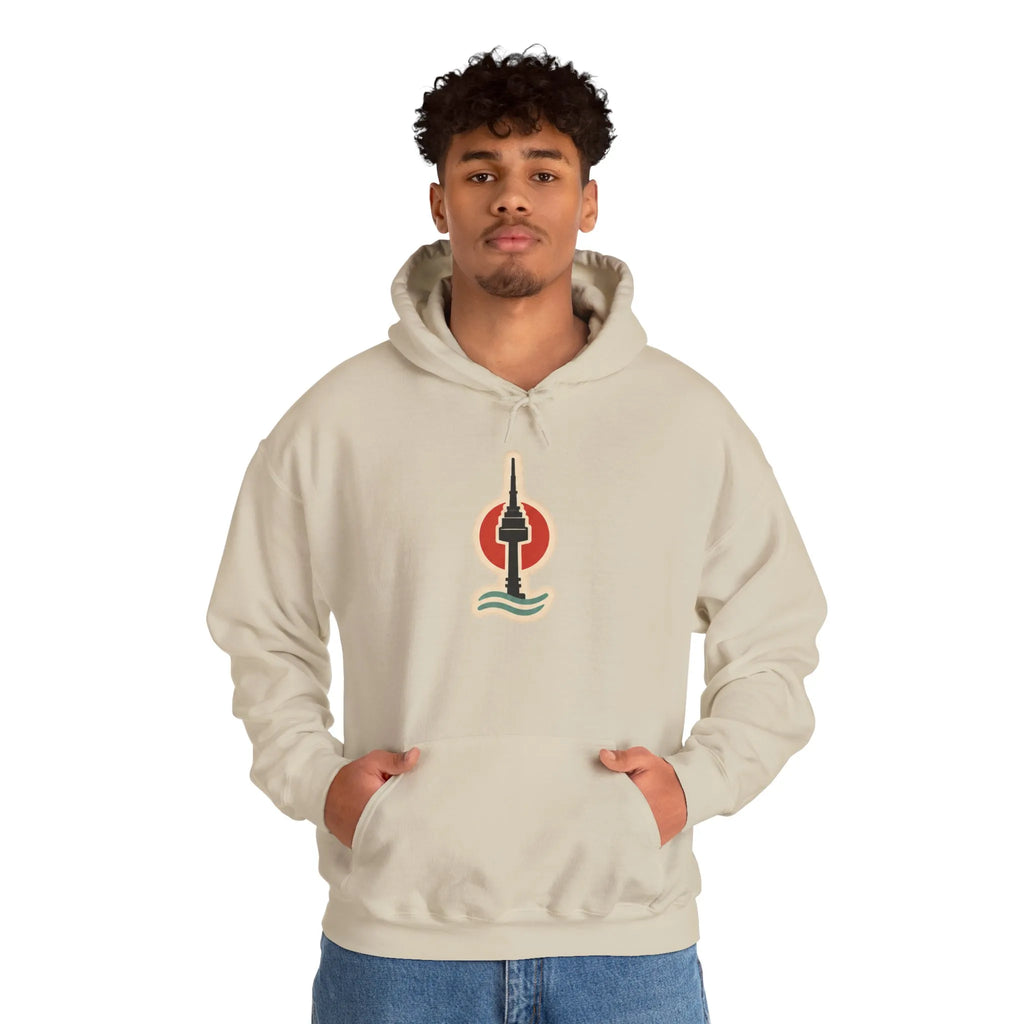 Man wearing a beige hoodie with a small Seoul print on the chest