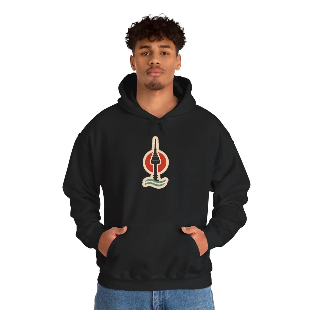 Man in a black hoodie with a small Seoul print on the chest