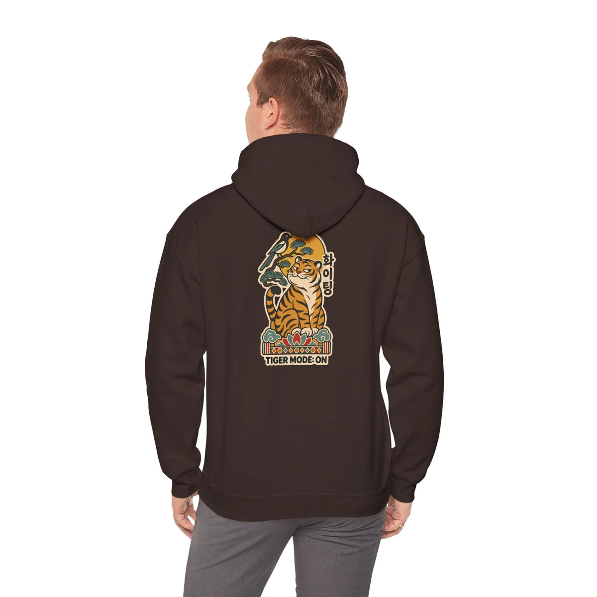 Back view of a coffee brown hoodie with a tiger print, worn by a man