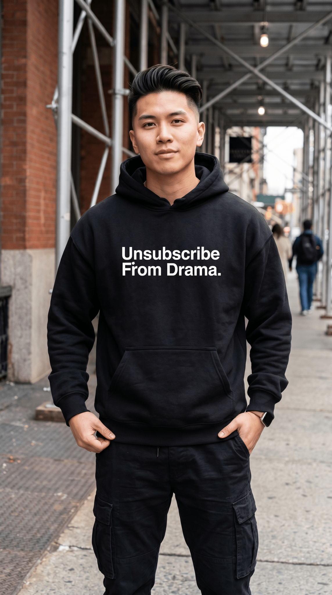 Model wearing Unsubscribe pullover hoodie, lifestyle close-up